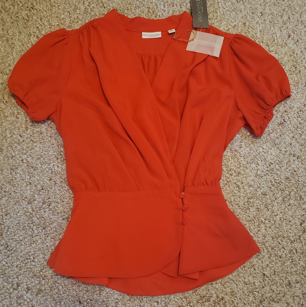 Eva Mendez peplum wrap blouse